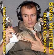 Olympic phenom Simon Whitfield goes up against the Wisequacks for a show upon his return from Beijing --- Simon recognizes that his Olympics gold and silver medals pale in comparison to Dr Dave's Grade 6 turkey shoot trophy